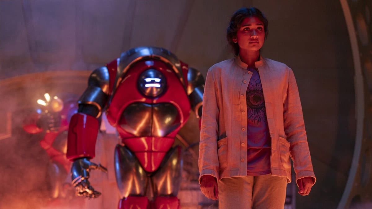 Belinda Chandra and a robot in The Robot Revolution. Image: BBC/Disney Plus